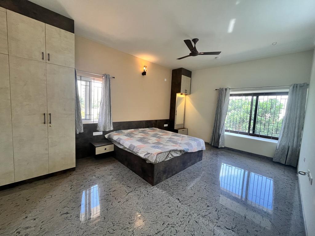 Primary bedroom at Saptha Sagara Villa
